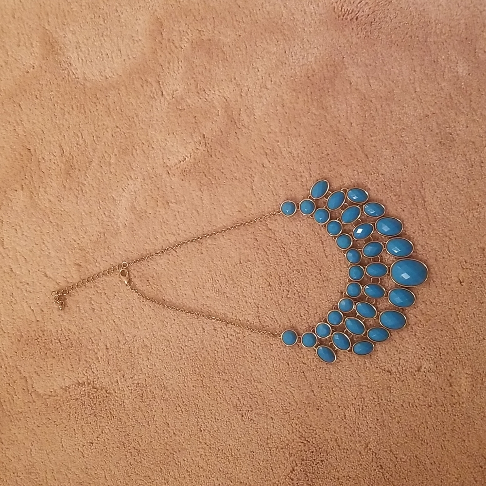 Turquoise color stone & gold tone cascade necklace